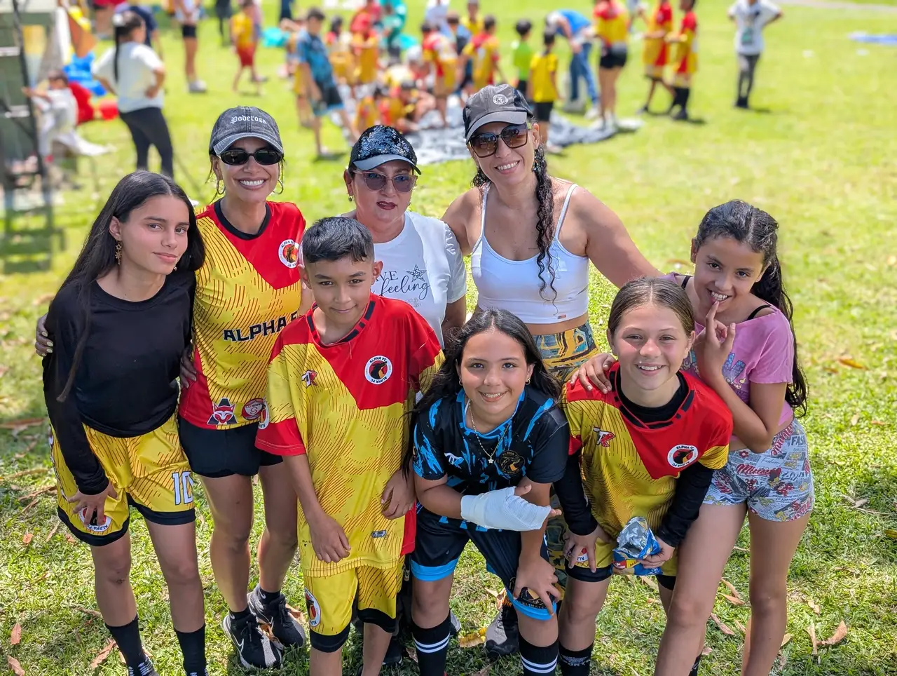 Alpha FC participants and coaches together after a community activity in Pereira